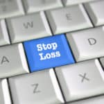 A “Stop Loss” button on a keyboard visualizes stop-loss insurance examples.